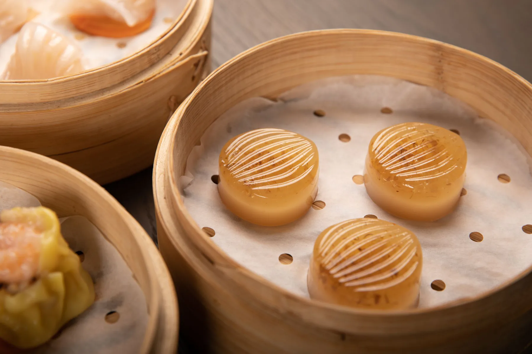 Assorted dim sum served in bamboo steamers for a Cantonese yum cha meal