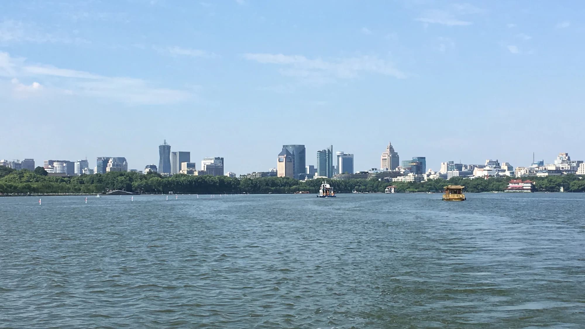 Panoramic West Lake shoreline and hills in Hangzhou
