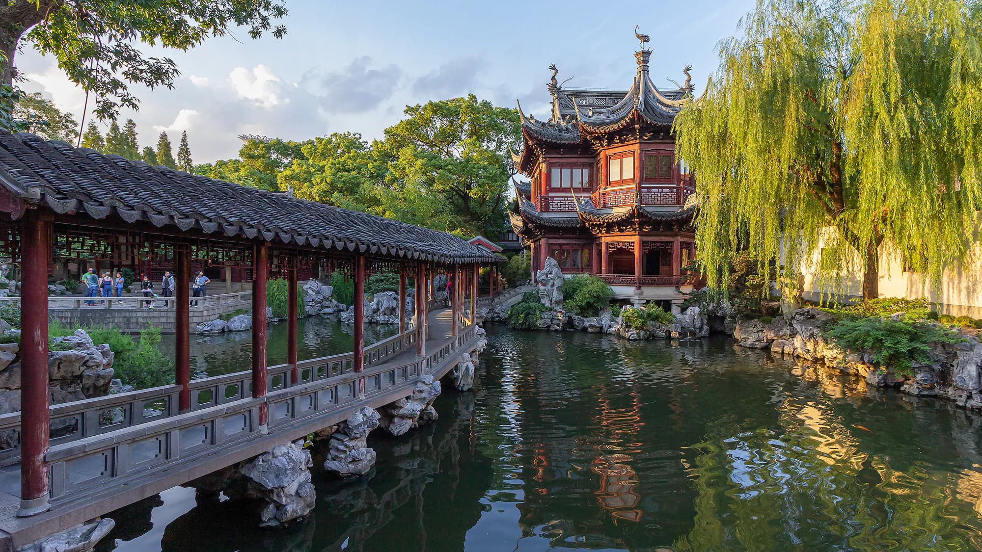Tingtao Tower, stonework, and a pond inside Shanghai's Yu Garden
