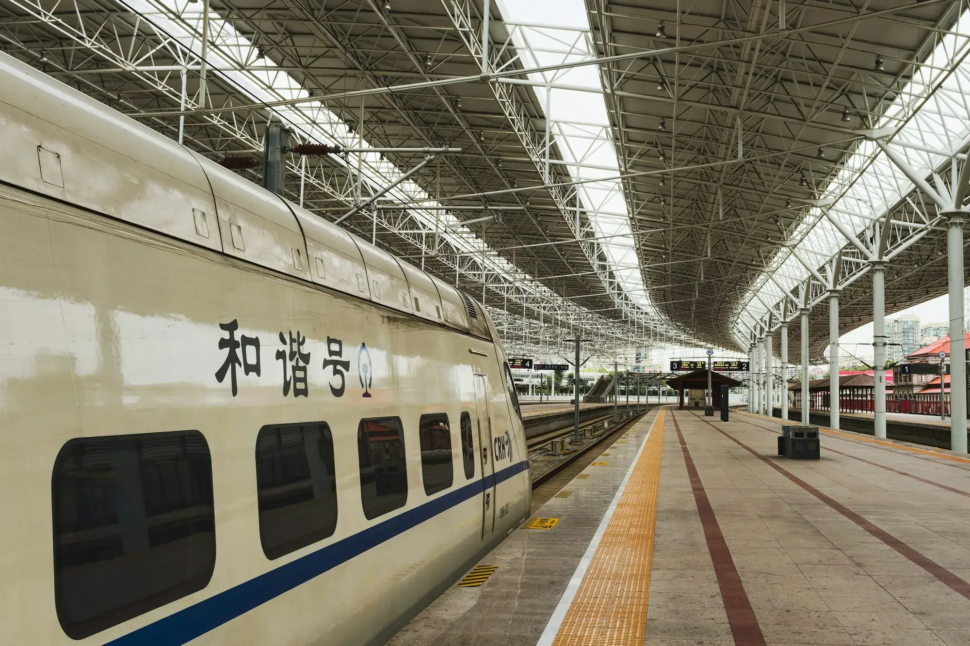 China high-speed train waiting at a modern railway platform